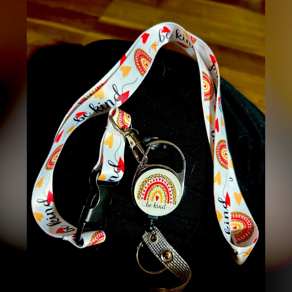 Be kind lantern badge reel